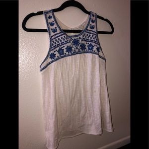 White Top with blue embroidery